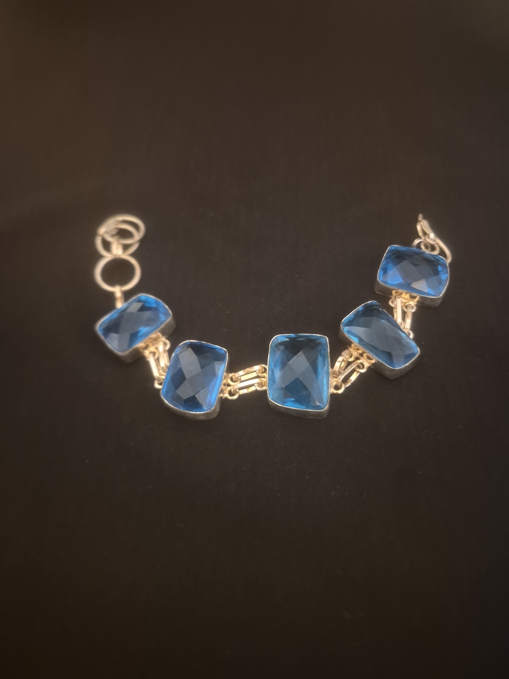 Gold-Tone Bracelet with Faceted Blue Gemstones